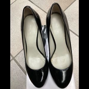 Black patent leather pumps